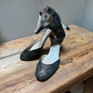 UNISA black and gold jacquard strappy heels